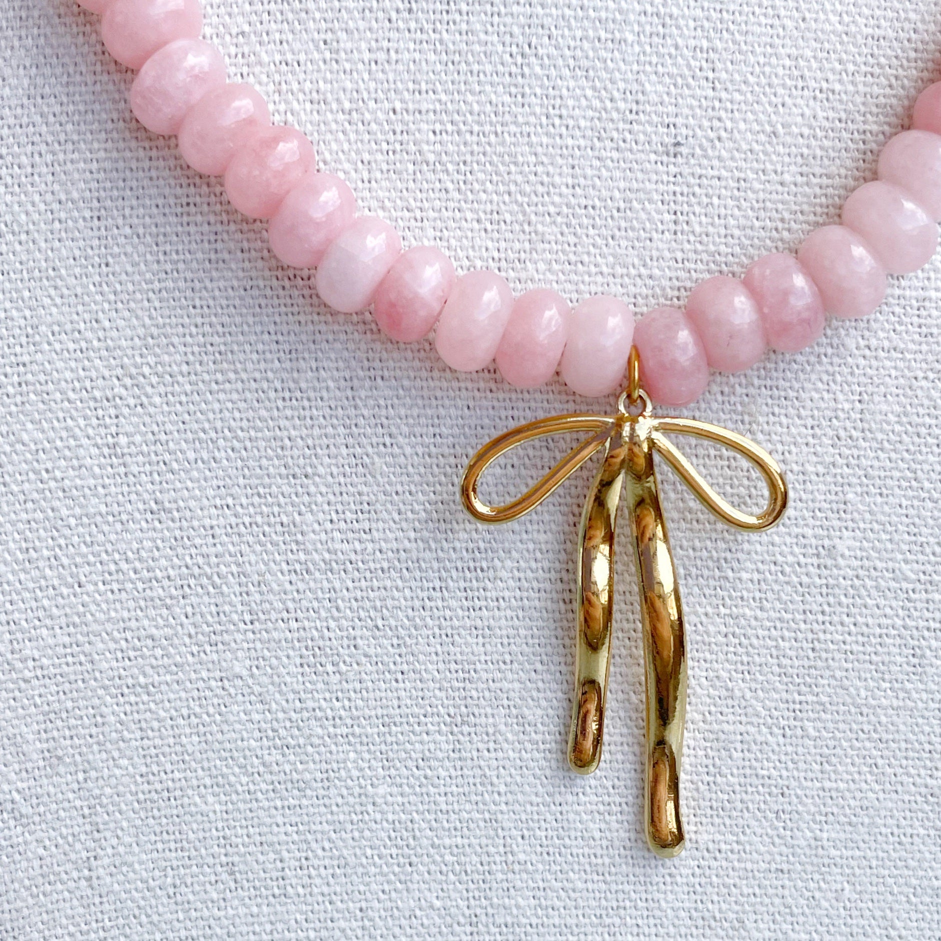 Collar piedras “Lazo” rosa