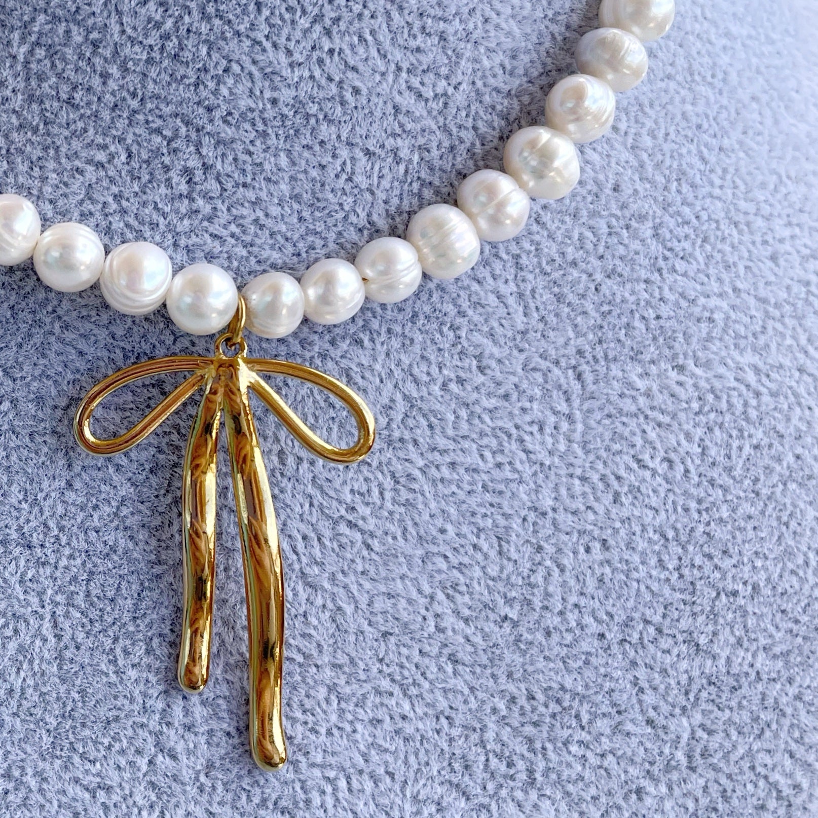 Collar perlas “Lazo” dorado