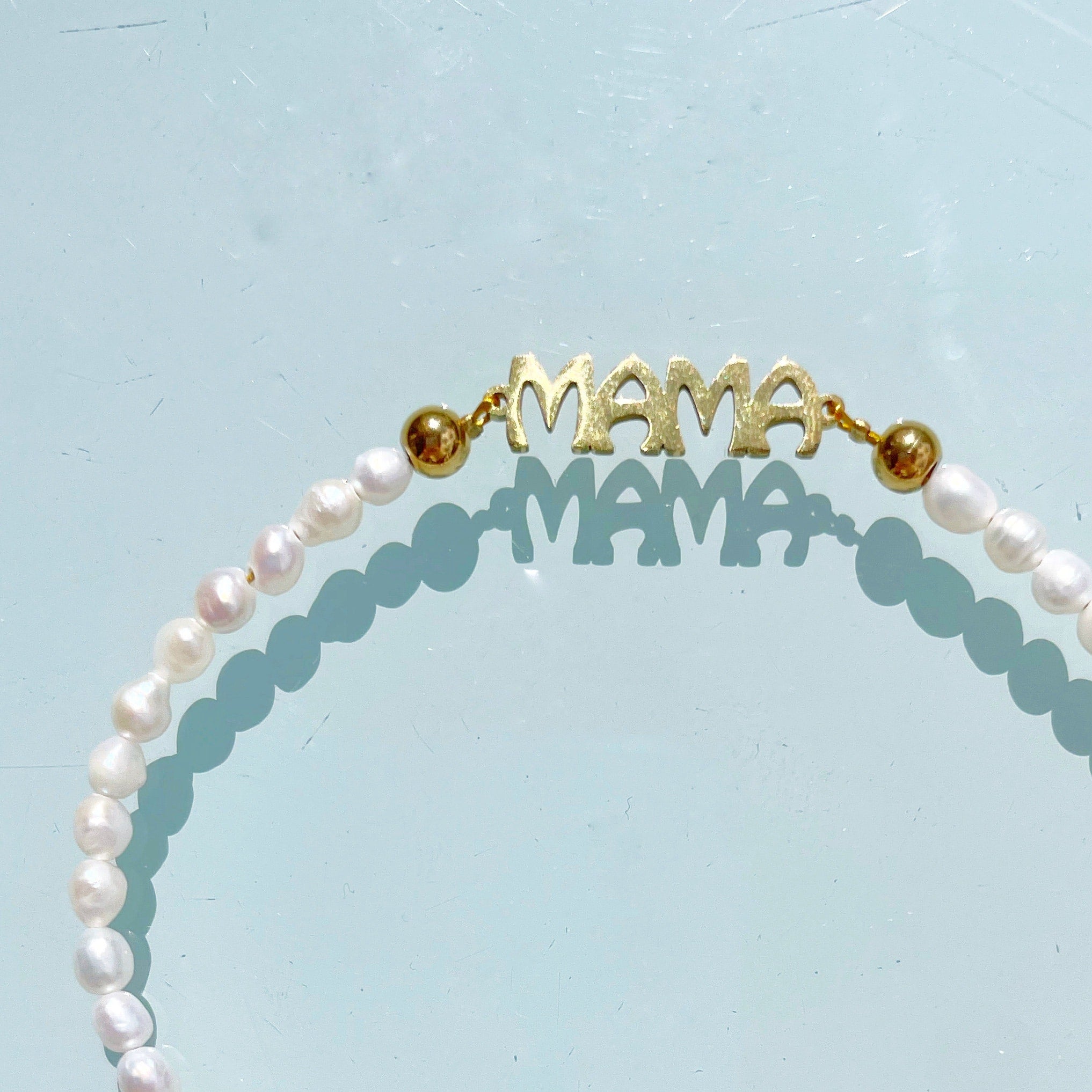 Pulsera “Mamá perlas”