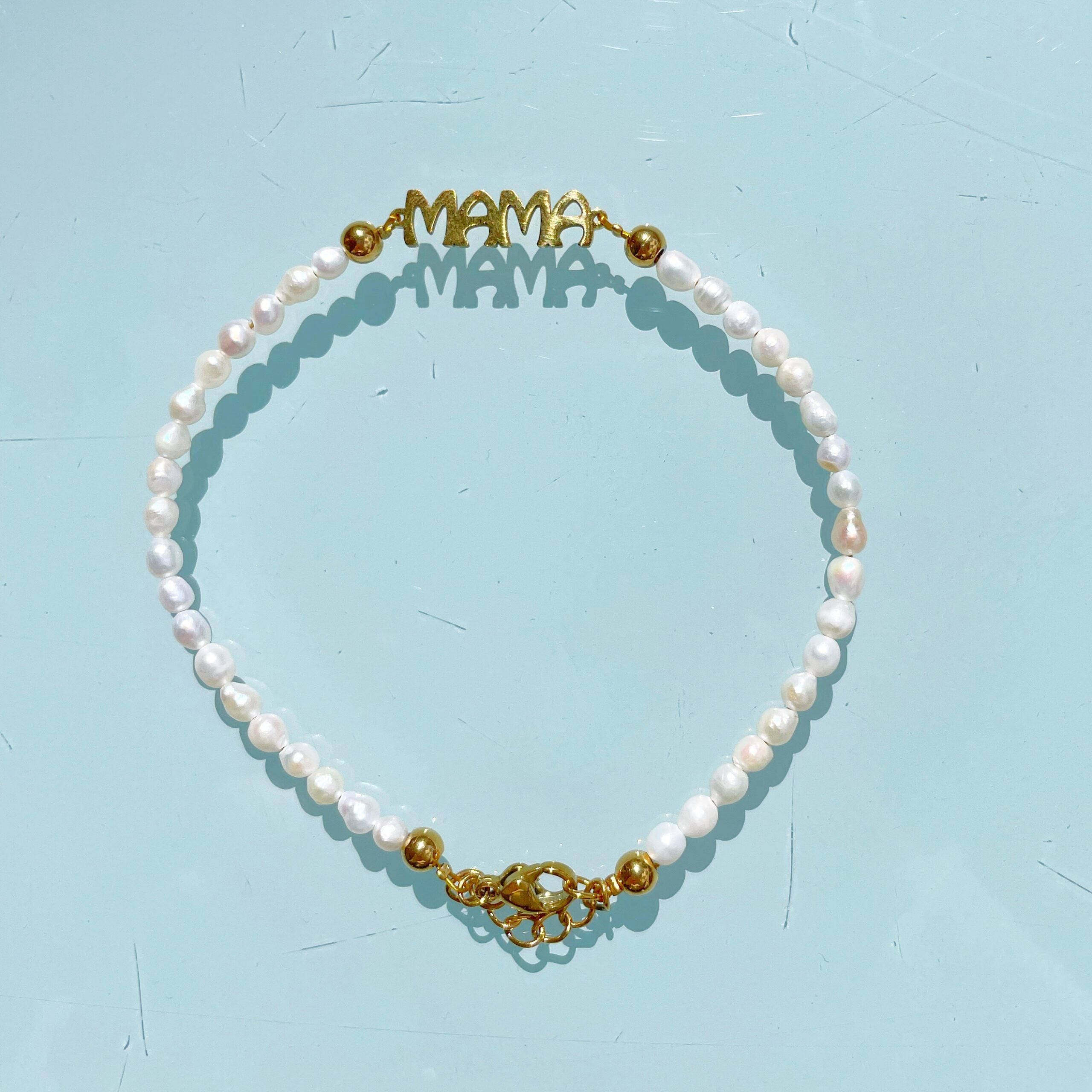 Pulsera “Mamá perlas”