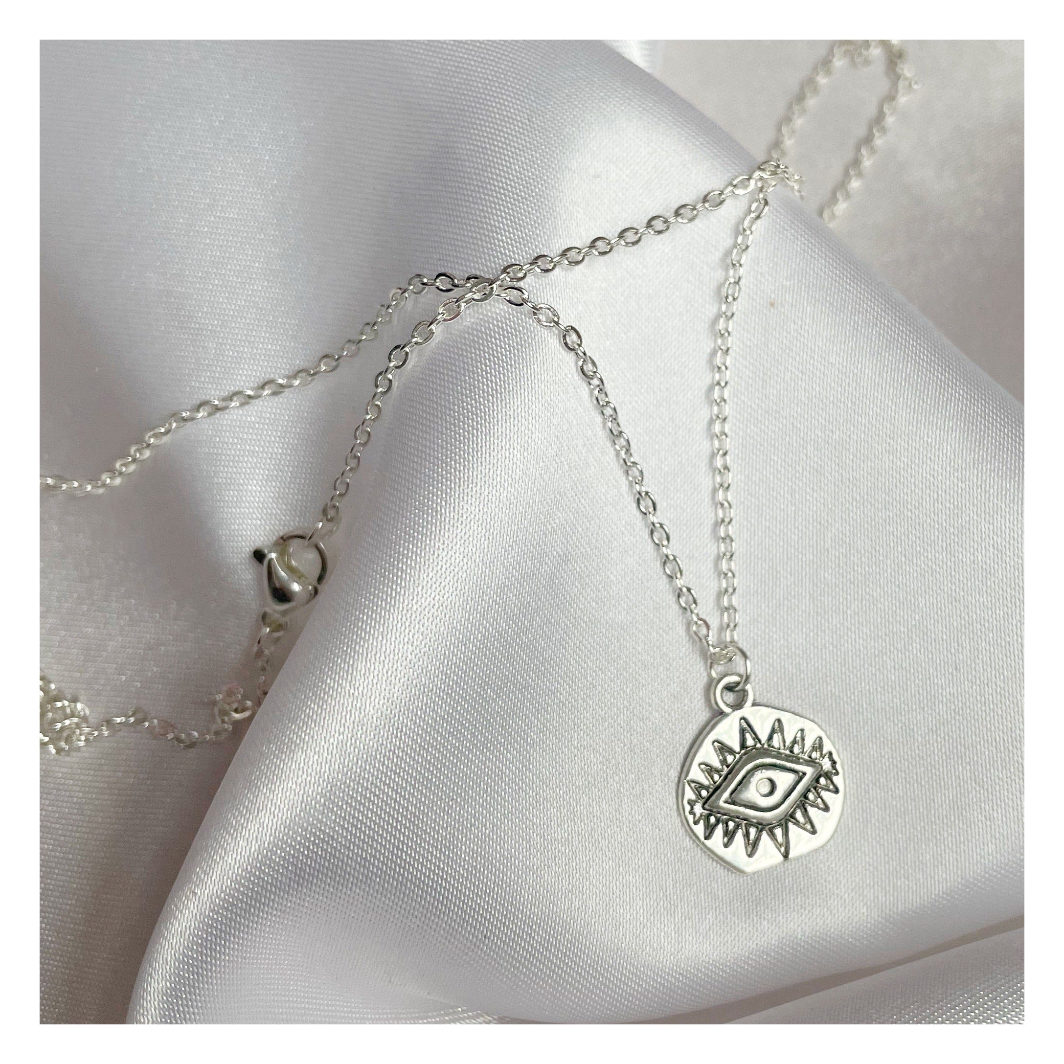 “Occhio” Collar plateado